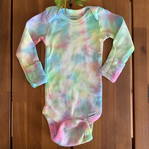 pastel baby onesies